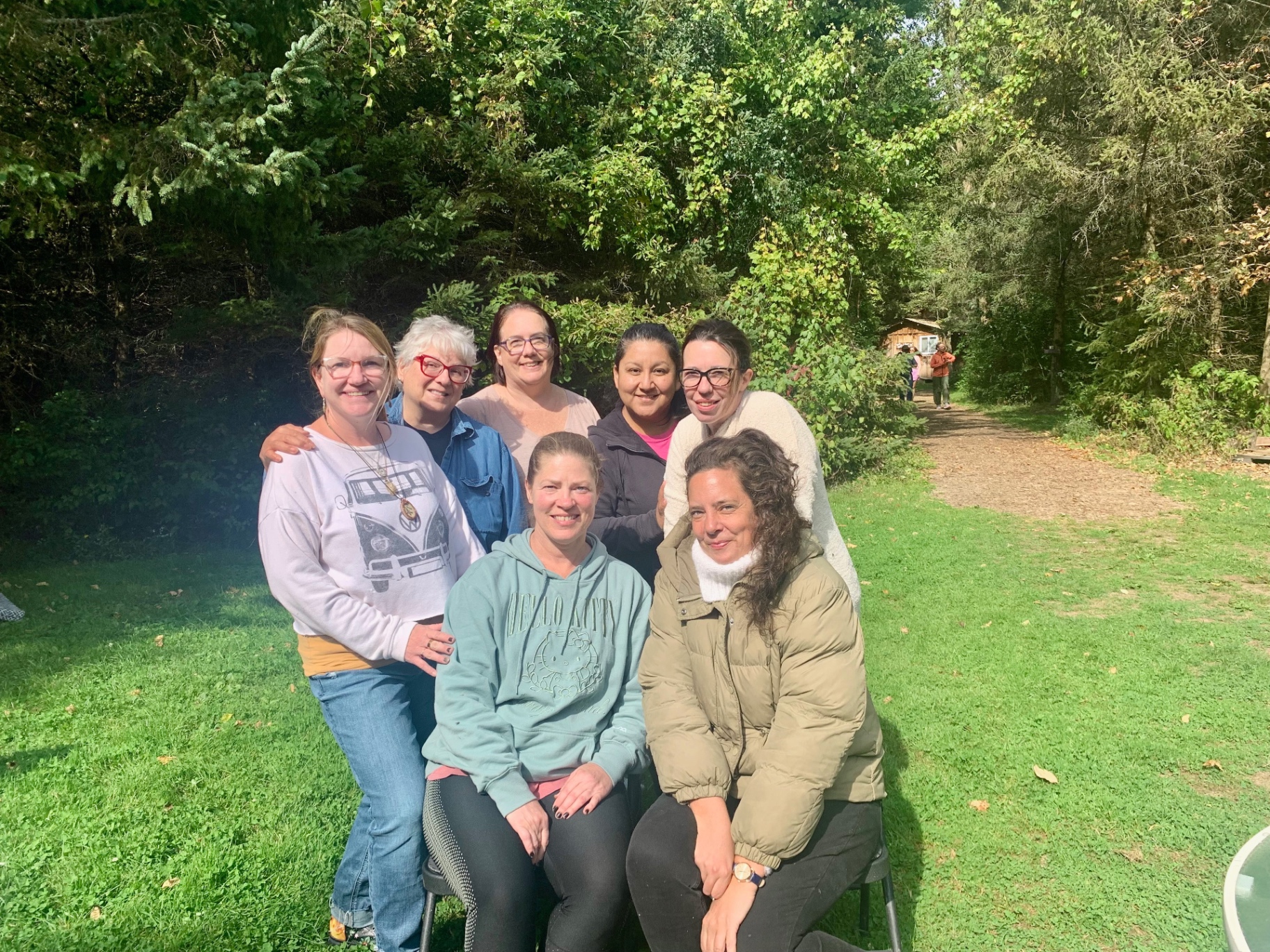Group of women smiling together in nature